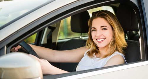 woman driving car